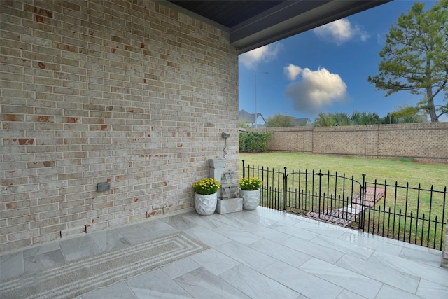 view of patio featuring a fenced backyard