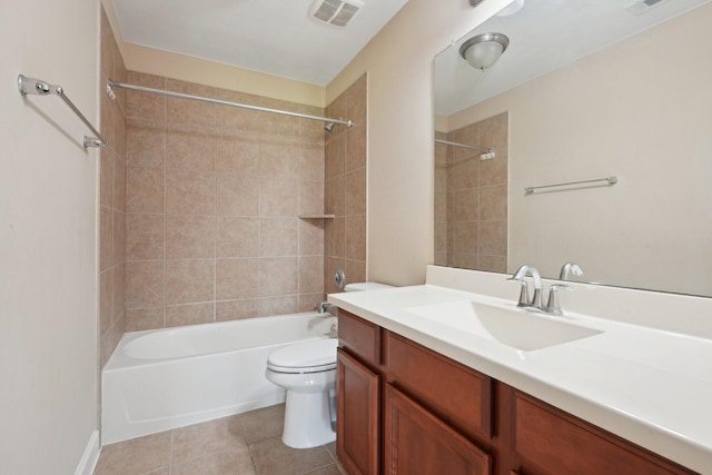 full bathroom with visible vents, bathing tub / shower combination, toilet, tile patterned floors, and vanity