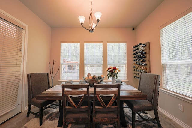 dining area featuring a chandelier