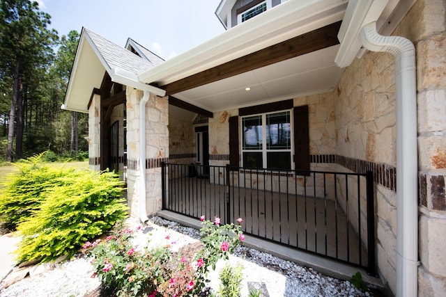 view of gate with a porch