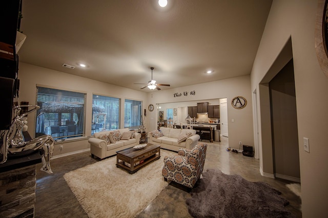 living room with ceiling fan