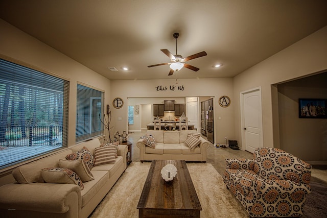 living room featuring ceiling fan