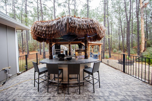 view of patio / terrace with an outdoor bar
