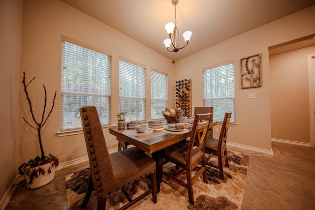 dining room featuring a chandelier