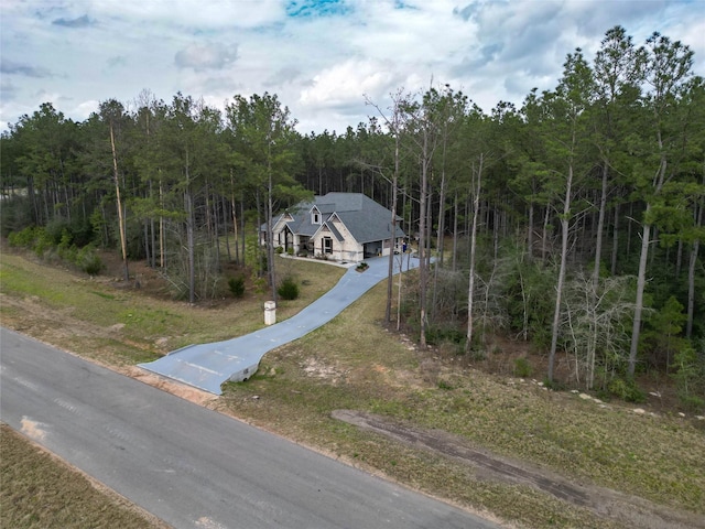 15516 Forest Grove Dr, Willis, TX 77378 - view of subject property featuring a heavily wooded area