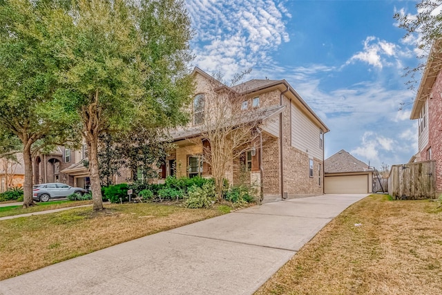 view of front of home with a garage and a front yard