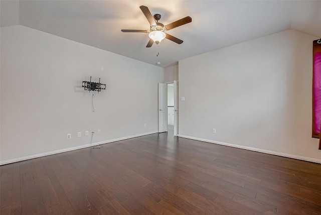 spare room featuring ceiling fan, lofted ceiling, and dark hardwood / wood-style floors