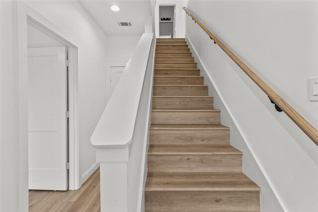 6350 Culberson St, Houston, TX 77021 - stairway with wood-type flooring
