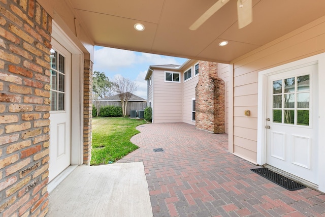 view of patio featuring cooling unit and ceiling fan