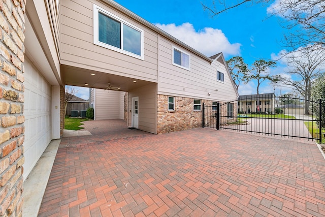 exterior space featuring central AC and a patio