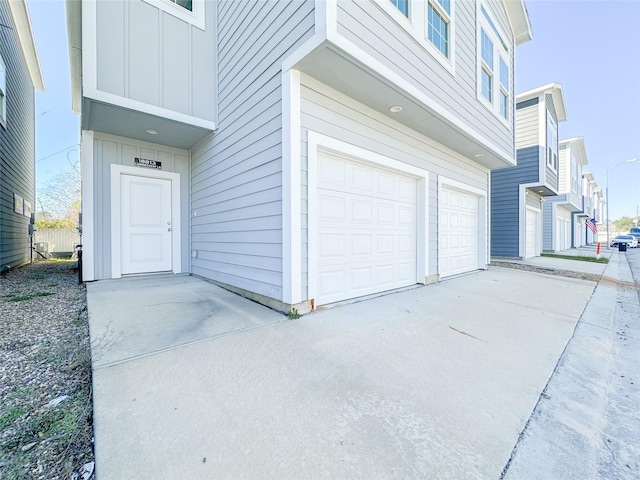 view of exterior entry with a garage