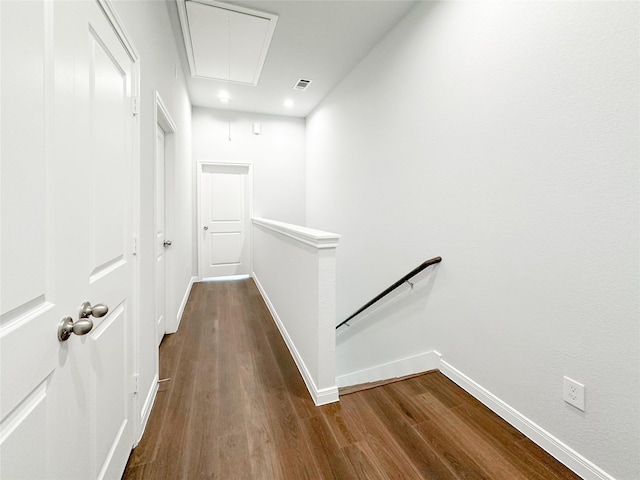 corridor with wood-type flooring