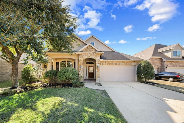 view of front facade with a garage and a front yard