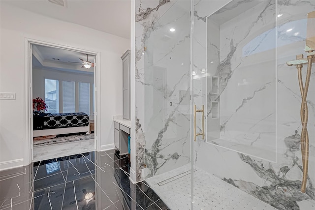 bathroom featuring a shower with shower door