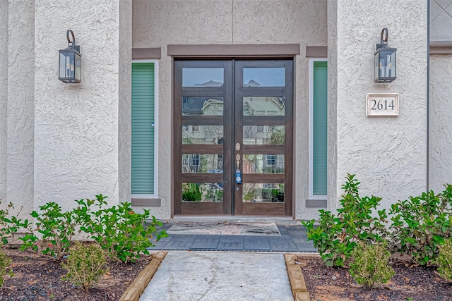 view of exterior entry with french doors