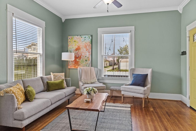 sitting room featuring crown molding, plenty of natural light, and dark hardwood / wood-style floors