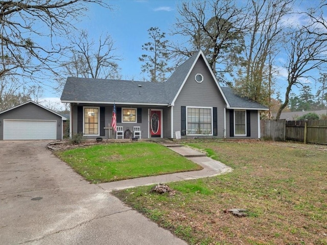 4 Rain Drop Dr, Lufkin, TX 75901 - view of front of home featuring an outbuilding, a garage, and a porch