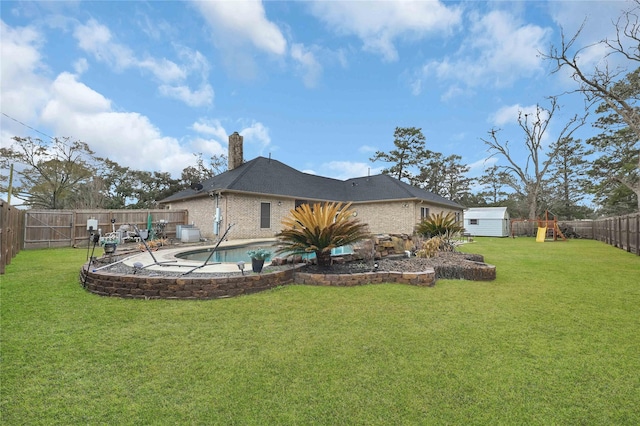 rear view of house featuring a fenced in pool, a storage shed, a yard, central AC unit, and a playground