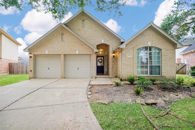 view of front of home with a garage