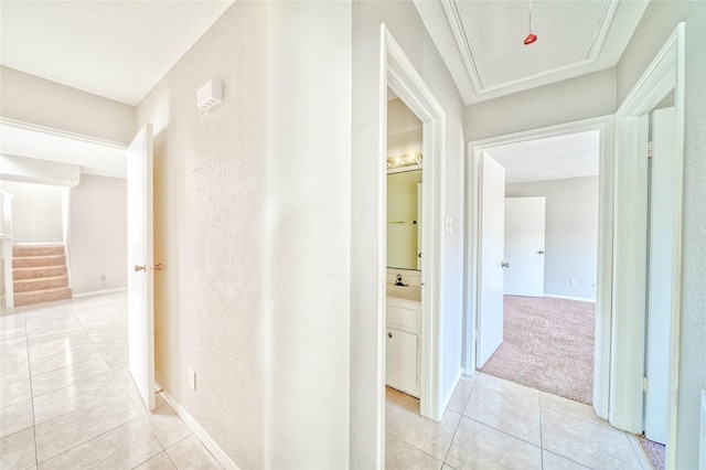 corridor featuring light tile patterned flooring