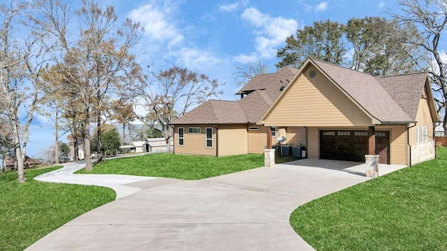 exterior space featuring a garage and a yard