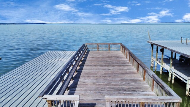 dock area featuring a water view