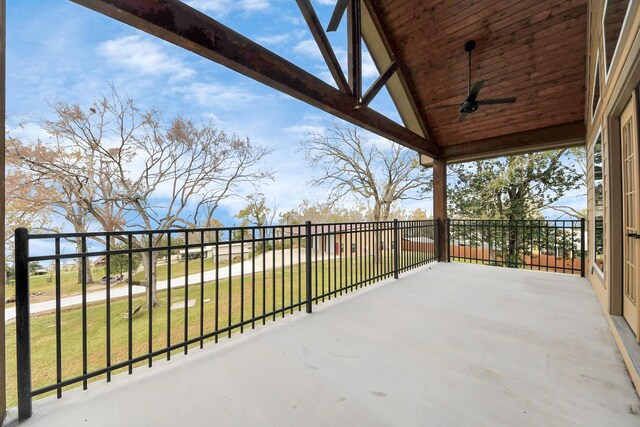 balcony featuring ceiling fan and a patio