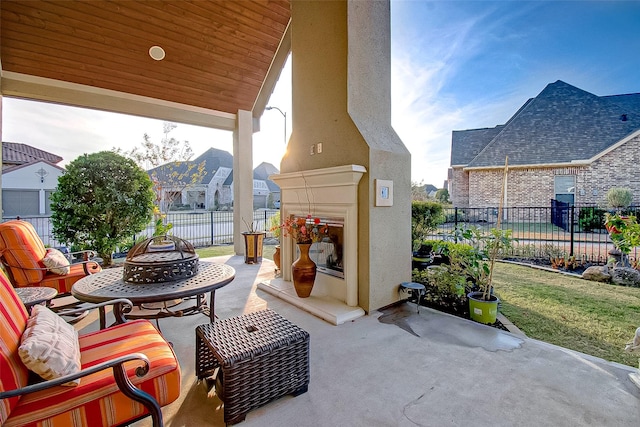 view of patio / terrace with a fire pit