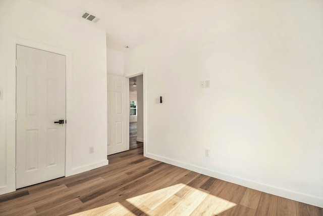 interior space with dark hardwood / wood-style flooring