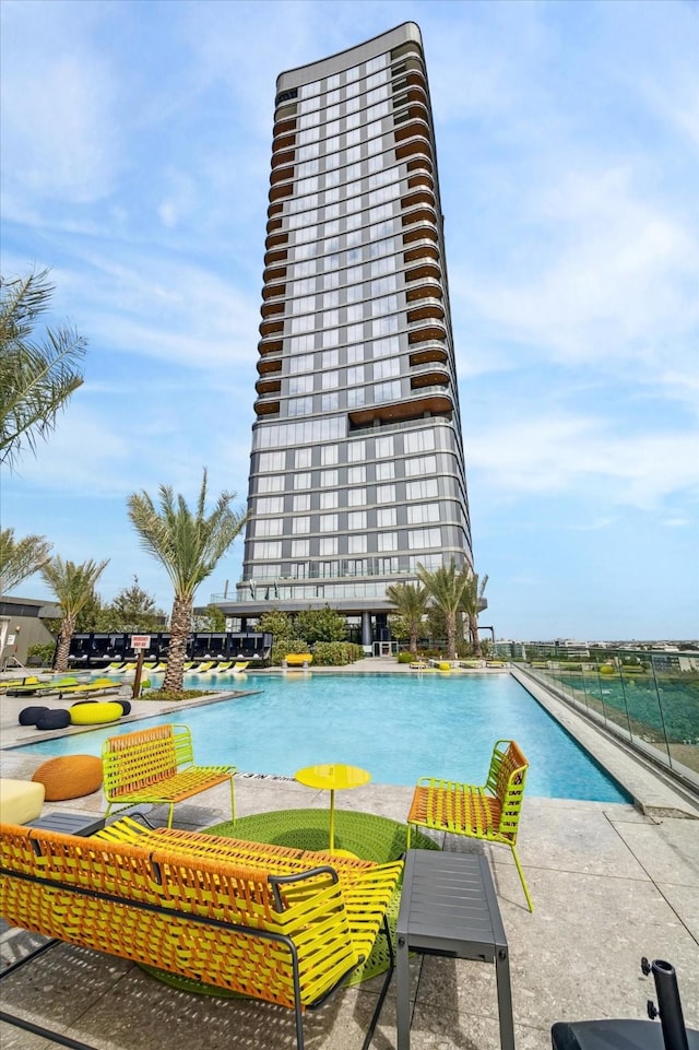 view of swimming pool with a patio area
