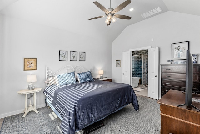 carpeted bedroom featuring ceiling fan, ensuite bath, and high vaulted ceiling