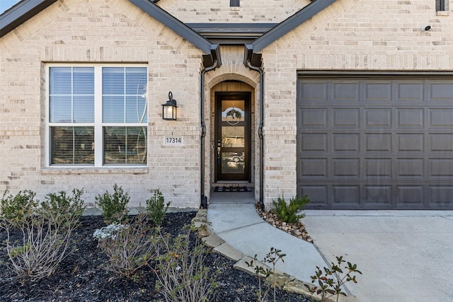 entrance to property featuring a garage