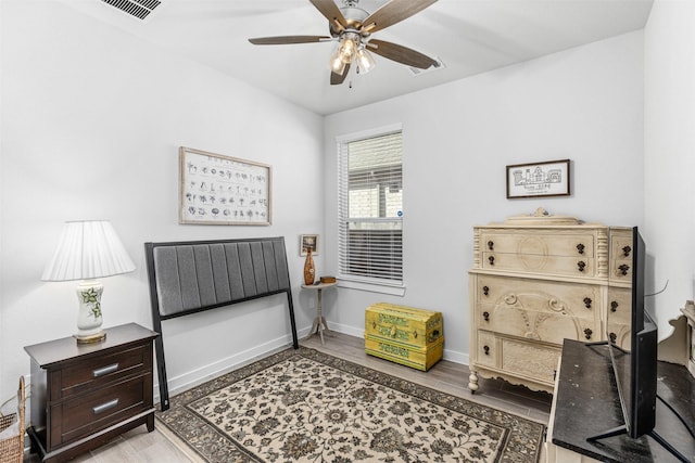 interior space featuring ceiling fan and light wood-type flooring