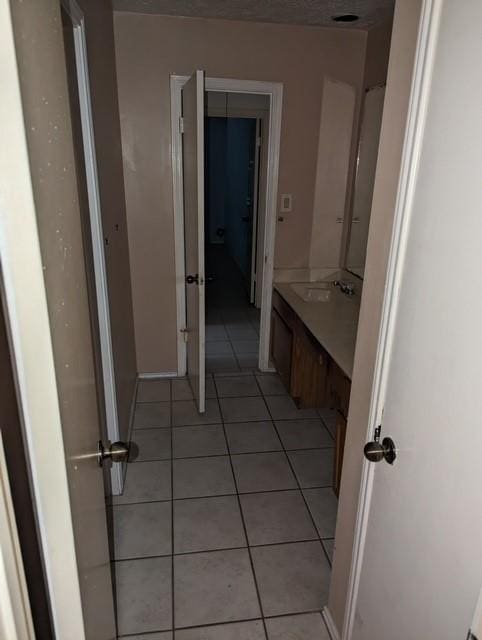 bathroom with sink and tile patterned floors