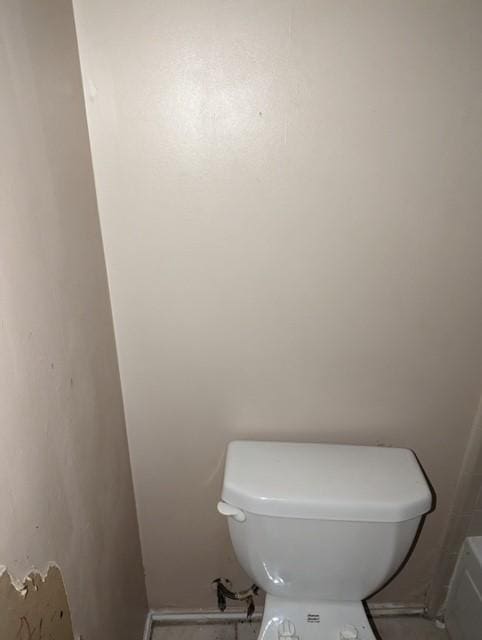 bathroom featuring toilet