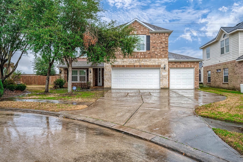 view of front of property with a garage