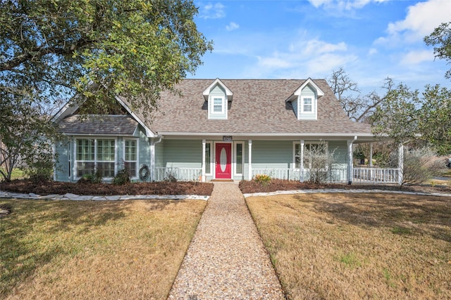 cape cod house with a front lawn and covered porch