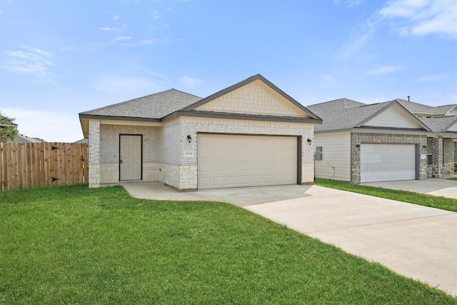 ranch-style home featuring a garage and a front yard