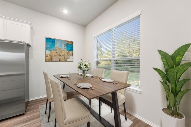 dining area featuring wood-type flooring