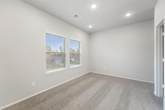 view of carpeted spare room