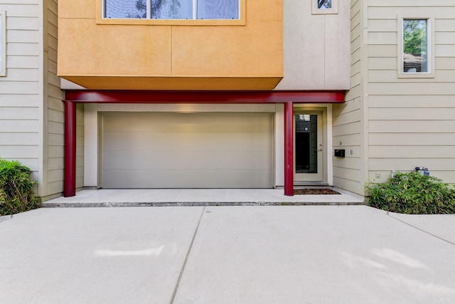 property entrance with a garage