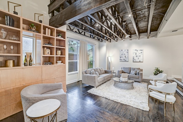 living room with dark hardwood / wood-style flooring