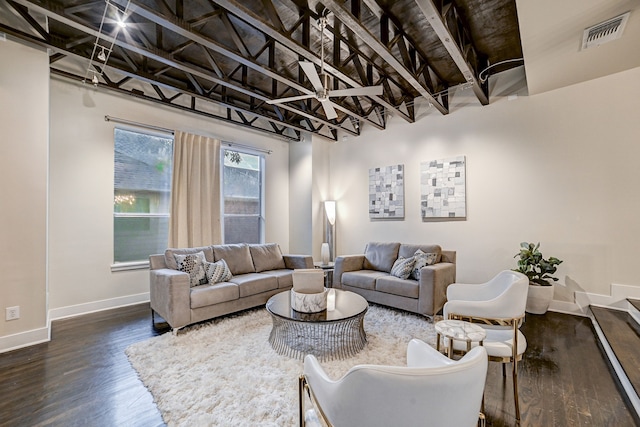 living room with dark hardwood / wood-style floors