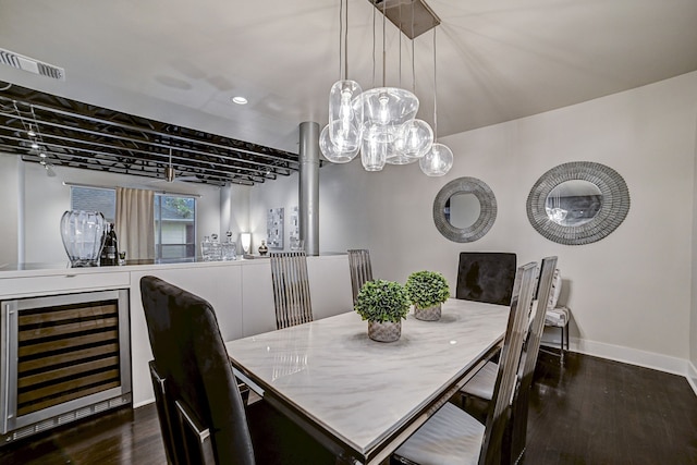 dining room with wine cooler and dark hardwood / wood-style floors