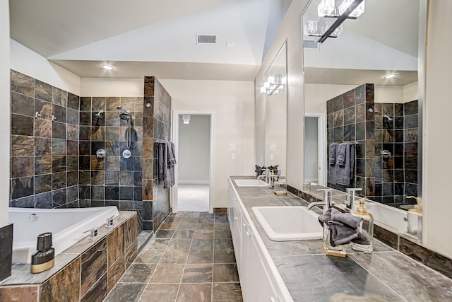 bathroom with shower with separate bathtub, lofted ceiling, and vanity