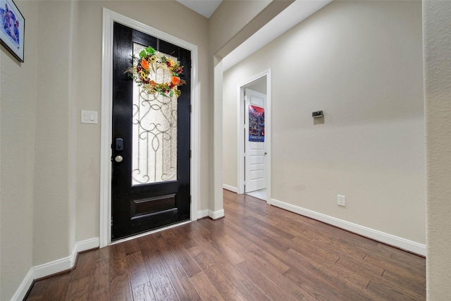 foyer featuring dark hardwood / wood-style floors