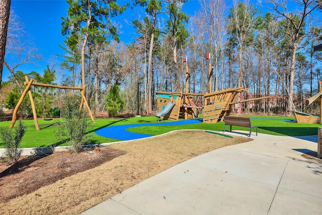 view of playground with a yard