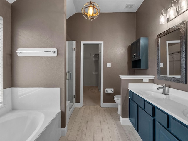 full bathroom featuring hardwood / wood-style flooring, vanity, toilet, and independent shower and bath