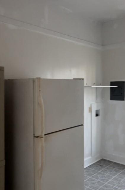 laundry room featuring electric panel