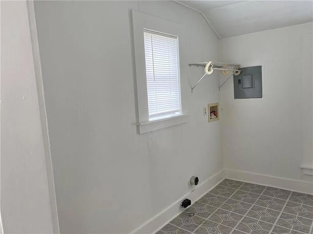 laundry area featuring laundry area, hookup for a washing machine, electric panel, and baseboards